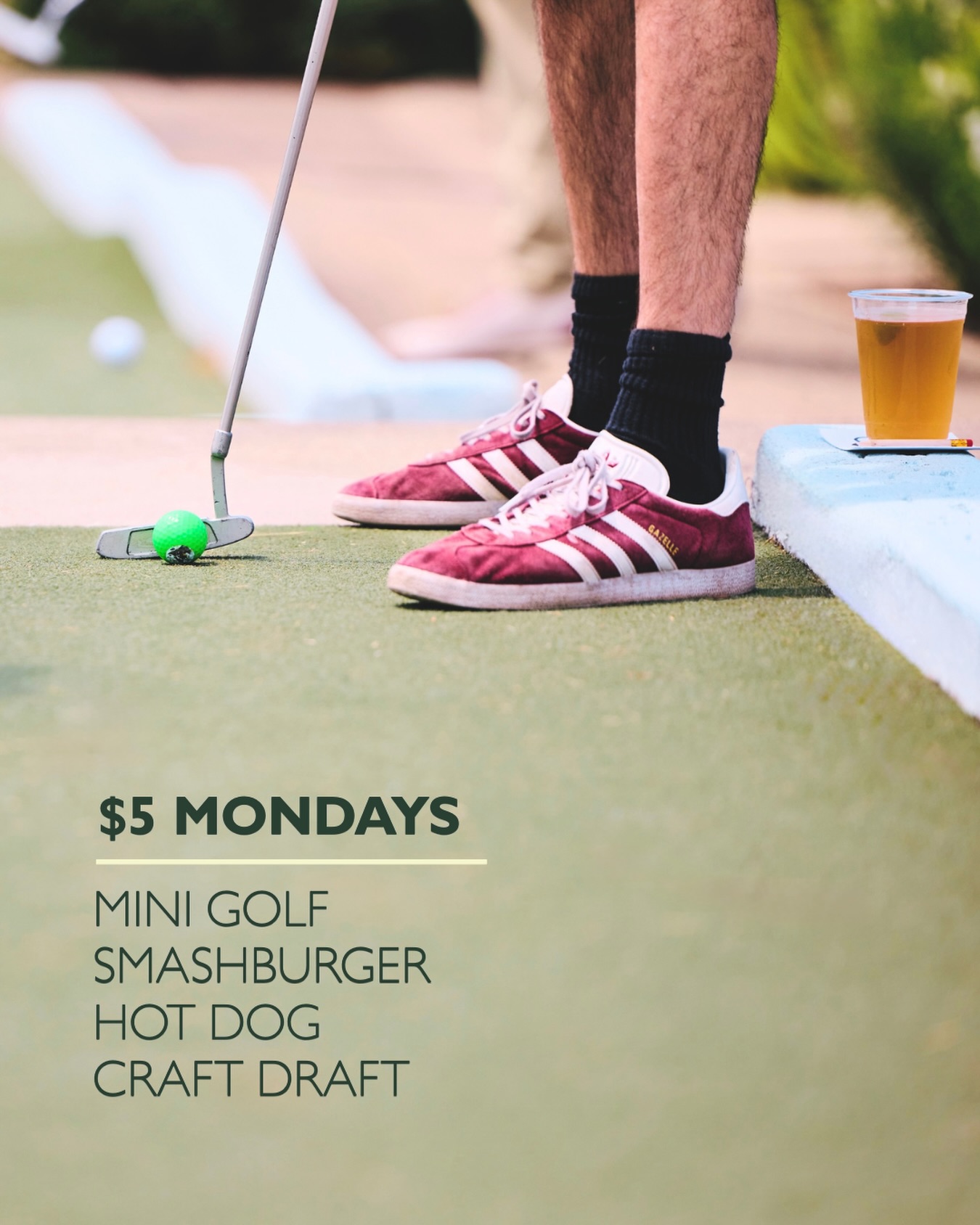 The Acres building exterior with the $5 Mondays mini golf sign